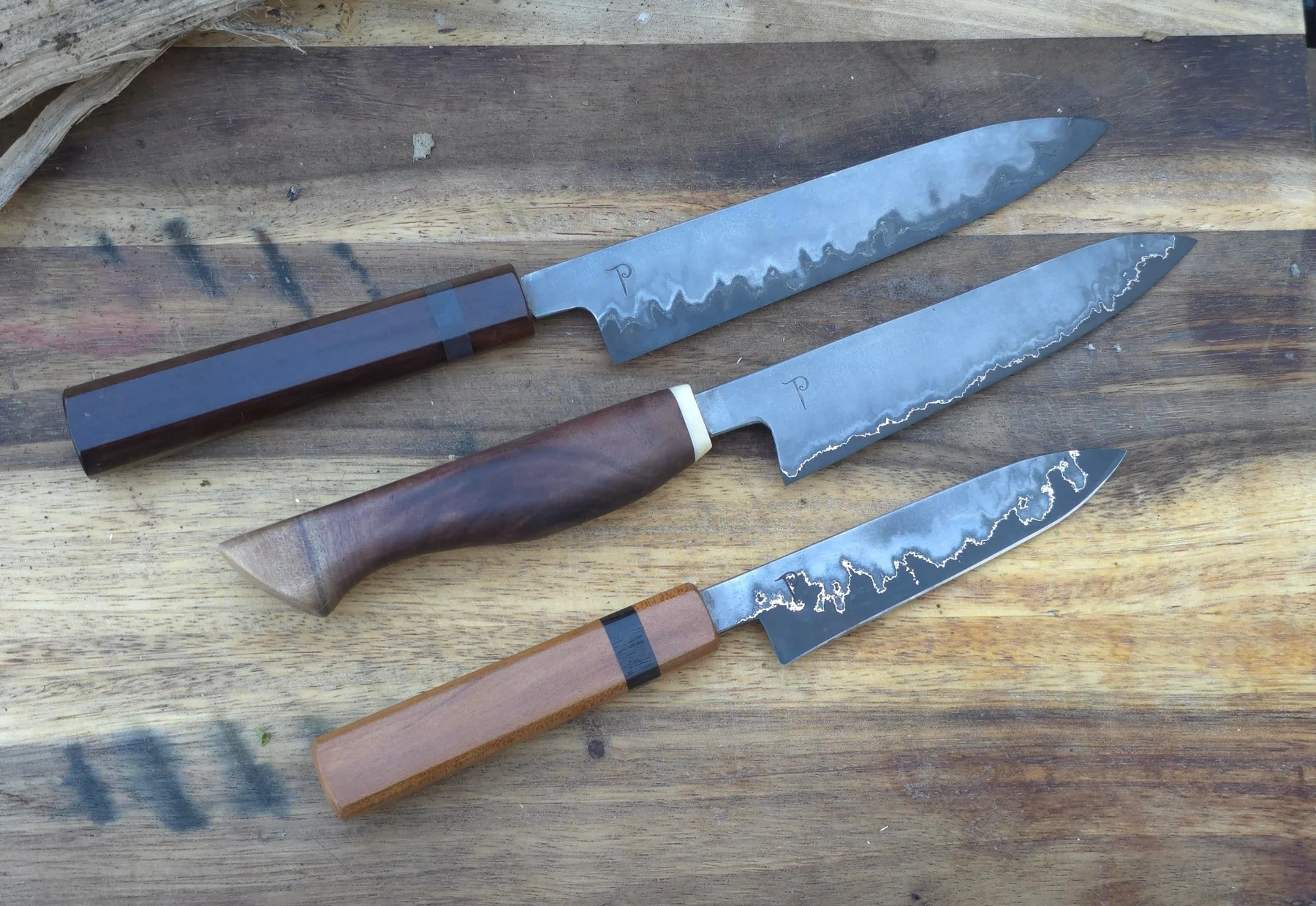 Three finished Polton knives arranged together